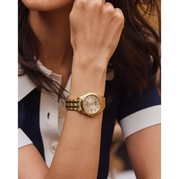 Citizen EO1222-50P - diseño elegante con manecillas luminiscentes y brazalete dorado.